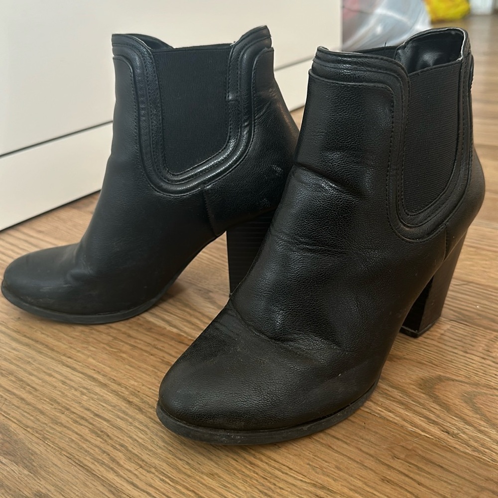 Call it Spring black heeled booties.